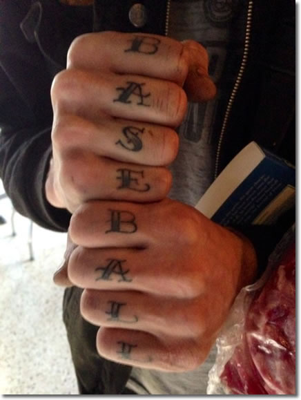 Brandon with his knuckle tats